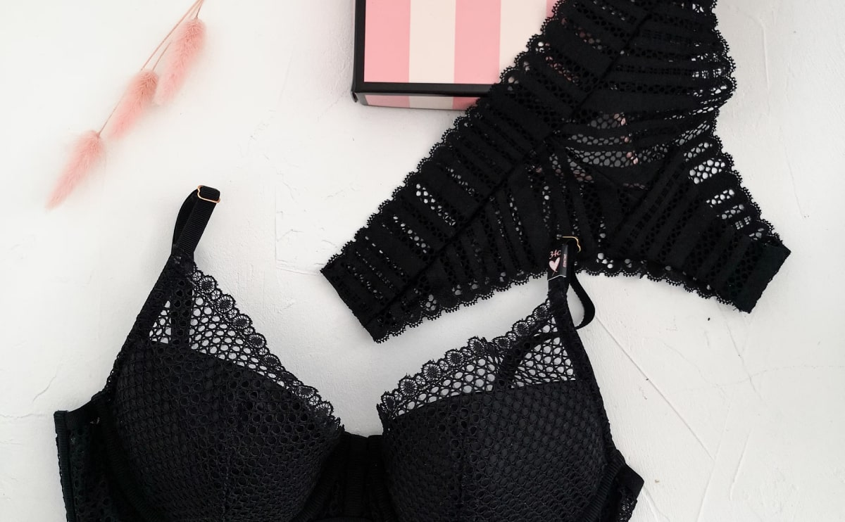 Black lace lingerie laid flat
